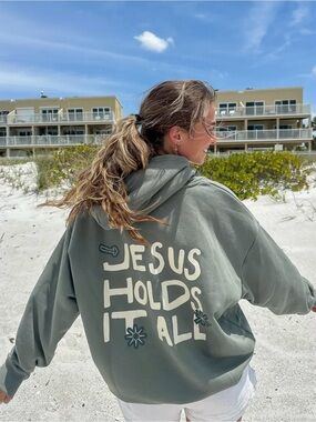 Elevated Faith Jesus Holds It All Hoodie - Sage Green